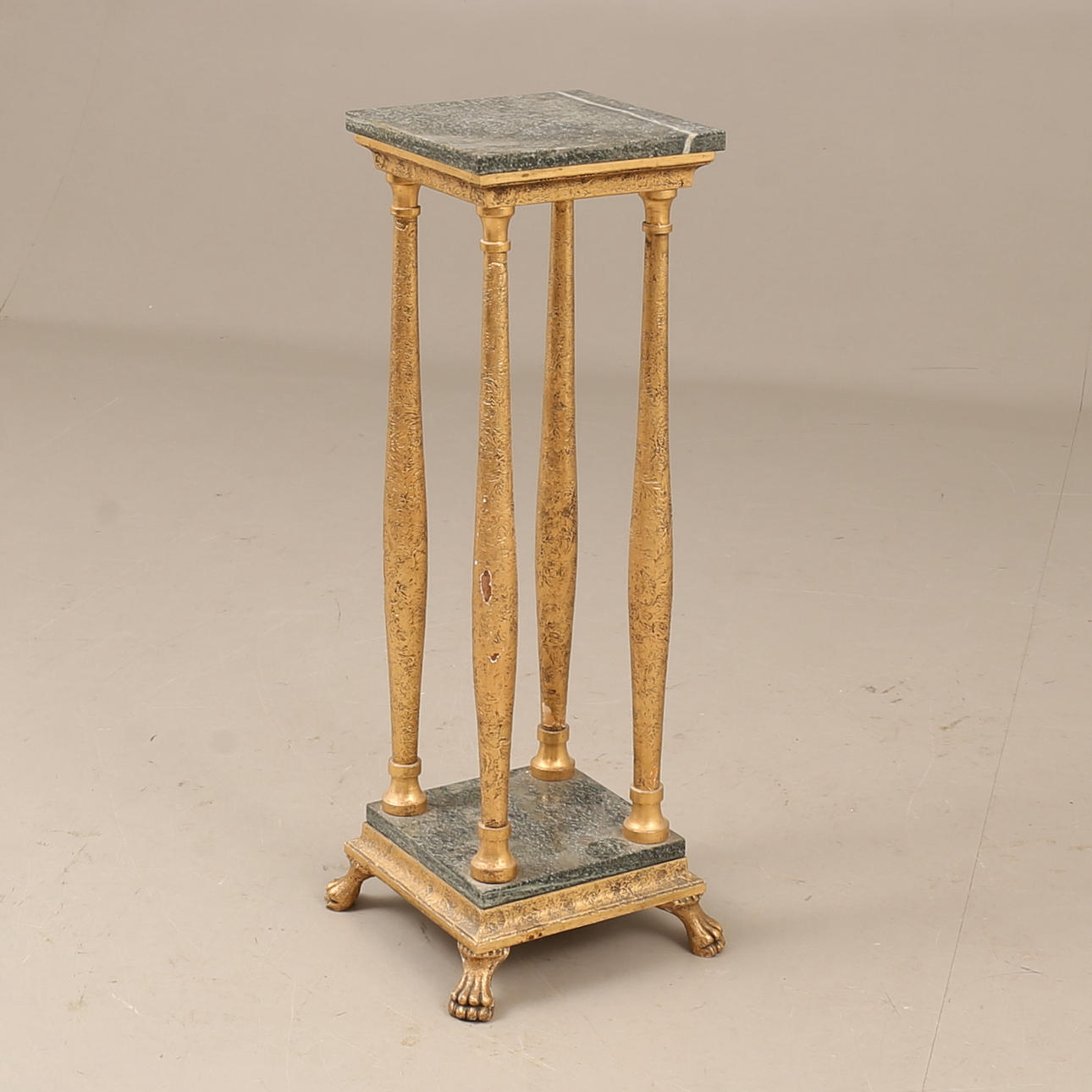 A bronze pedestal, marble top, 20th century.
