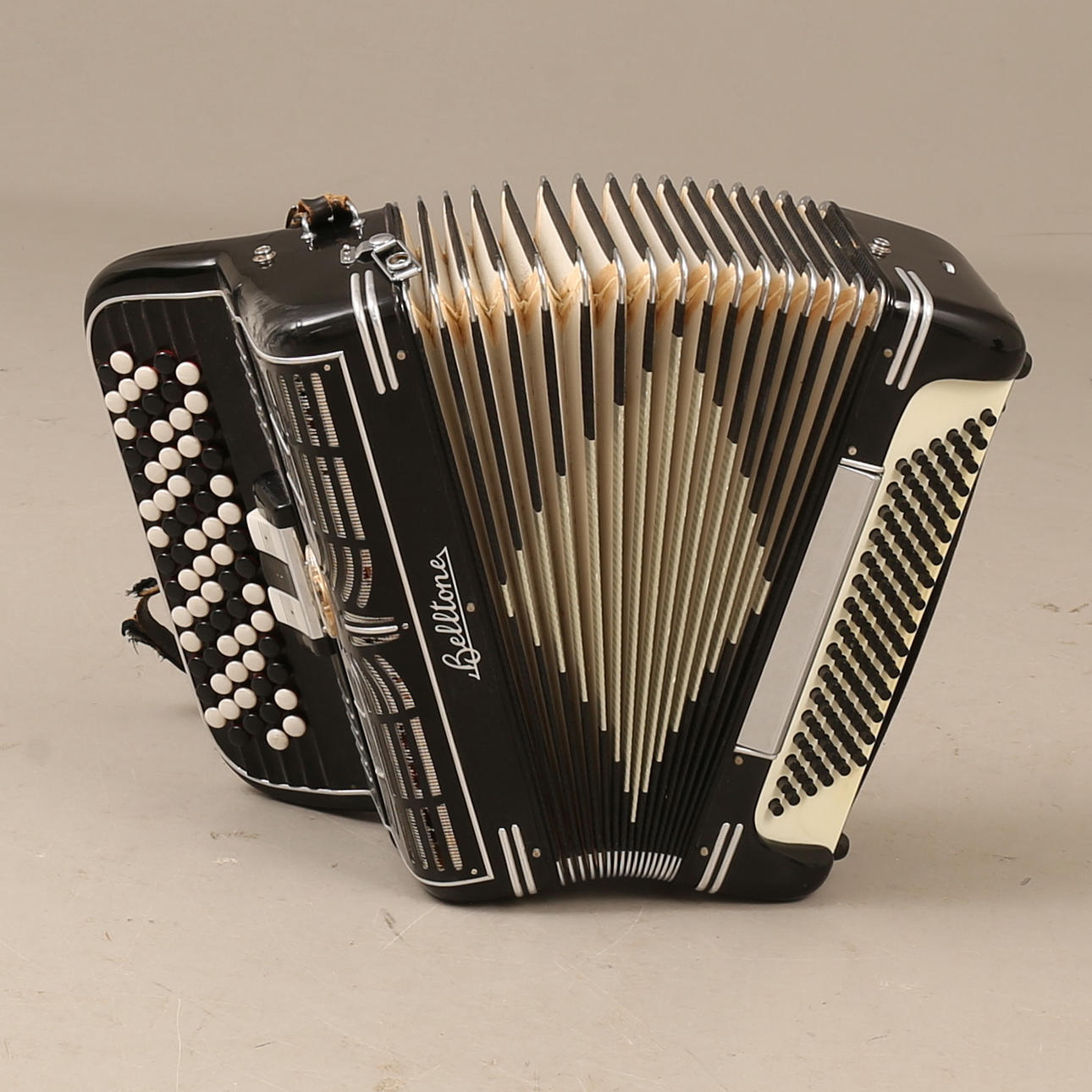 An accordion, Belltone, 20th century.
