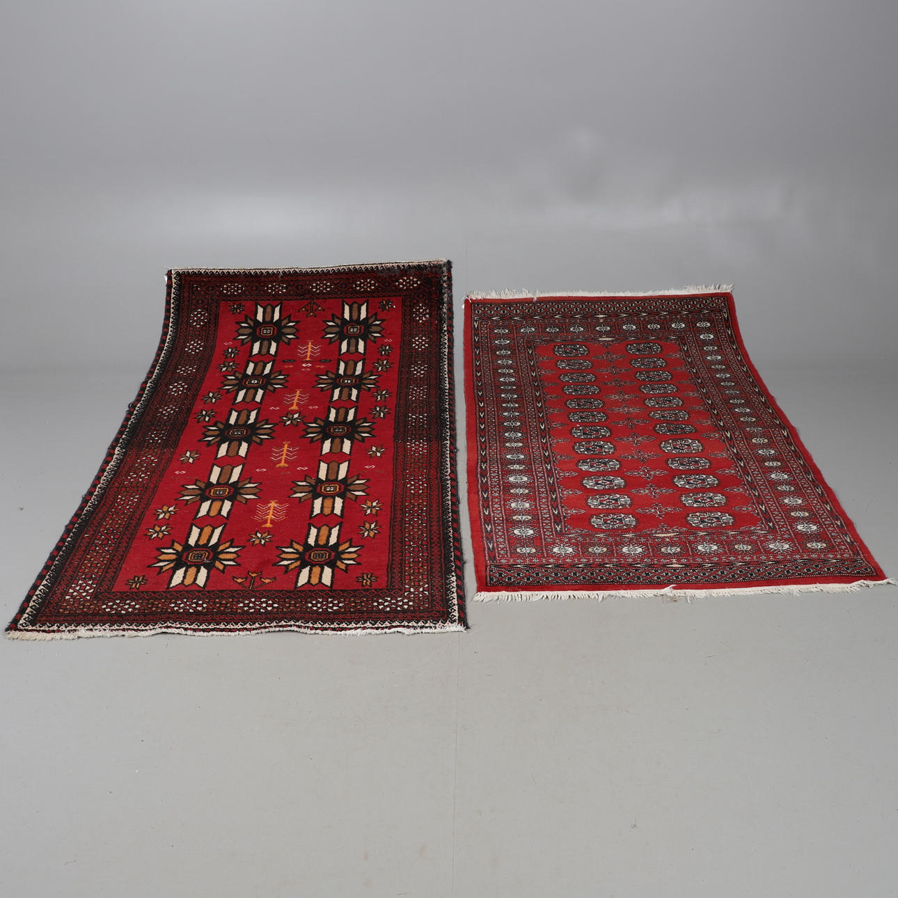 A MACHINE-MADE AFGHAN TURKMEN RUG.