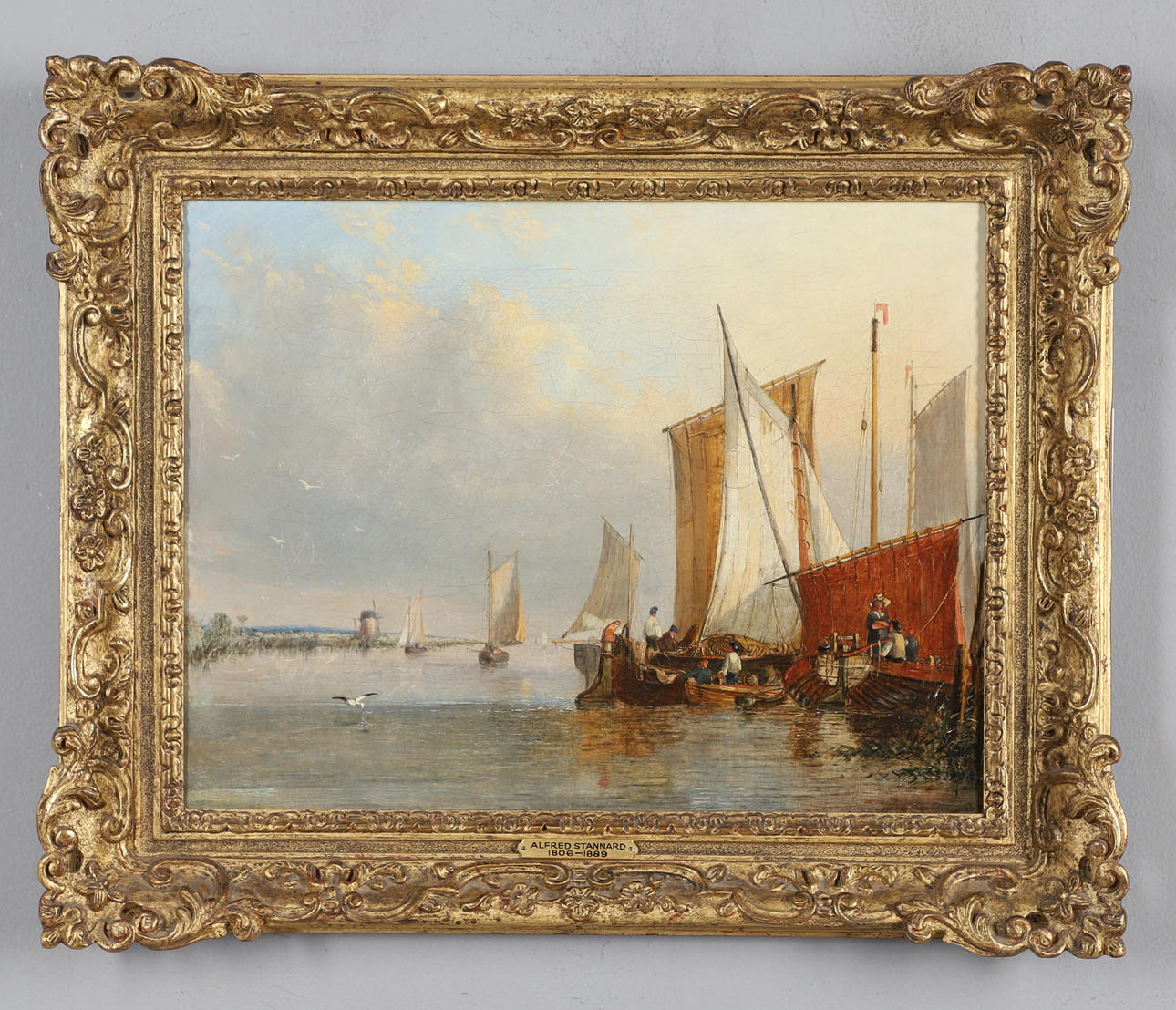 ATTRIBUTED TO ALFRED STANNARD (1806-1889). FISHING BOATS MOORED ON AN ESTUARY, WITH FIGURES.