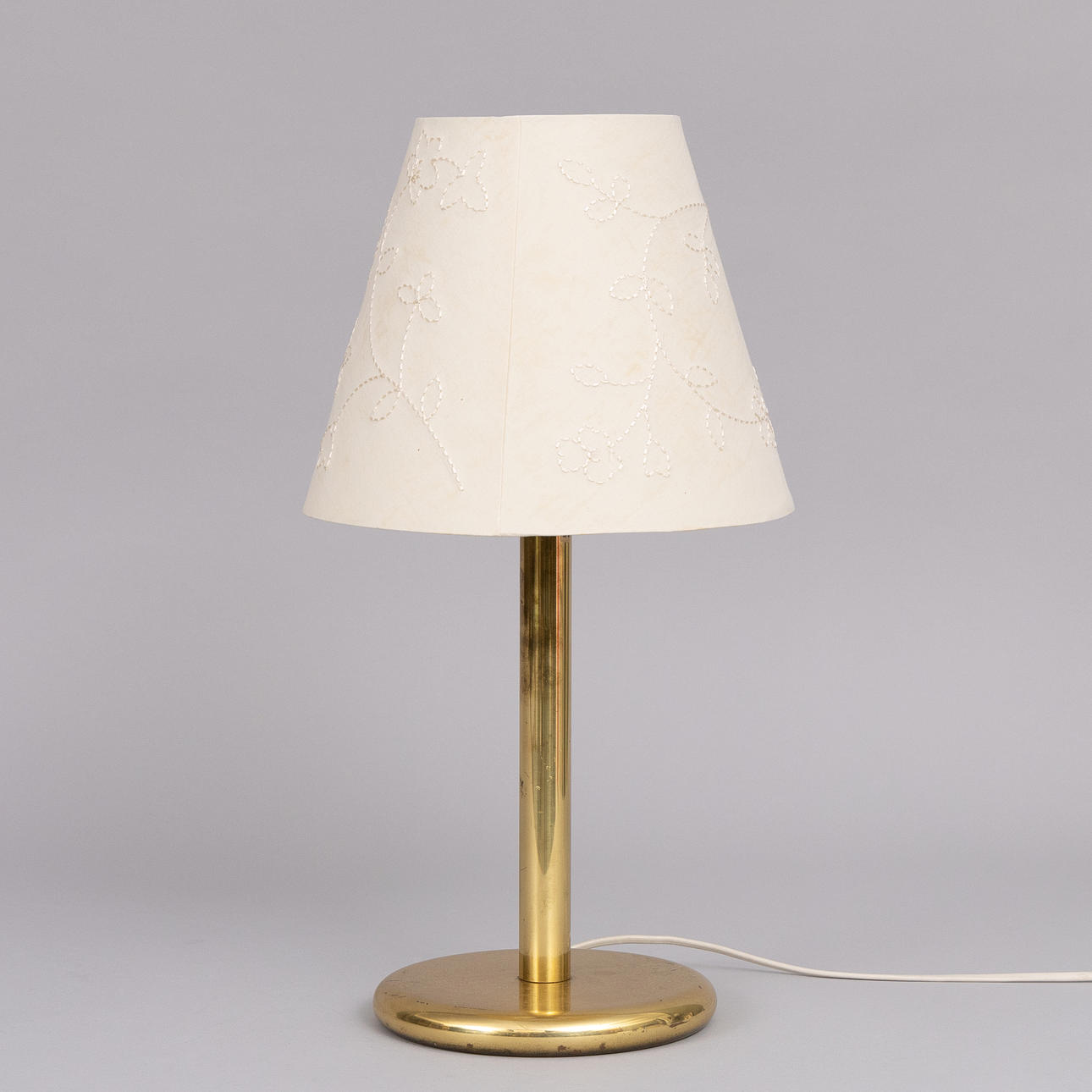 A brass table lamp, Ivars.