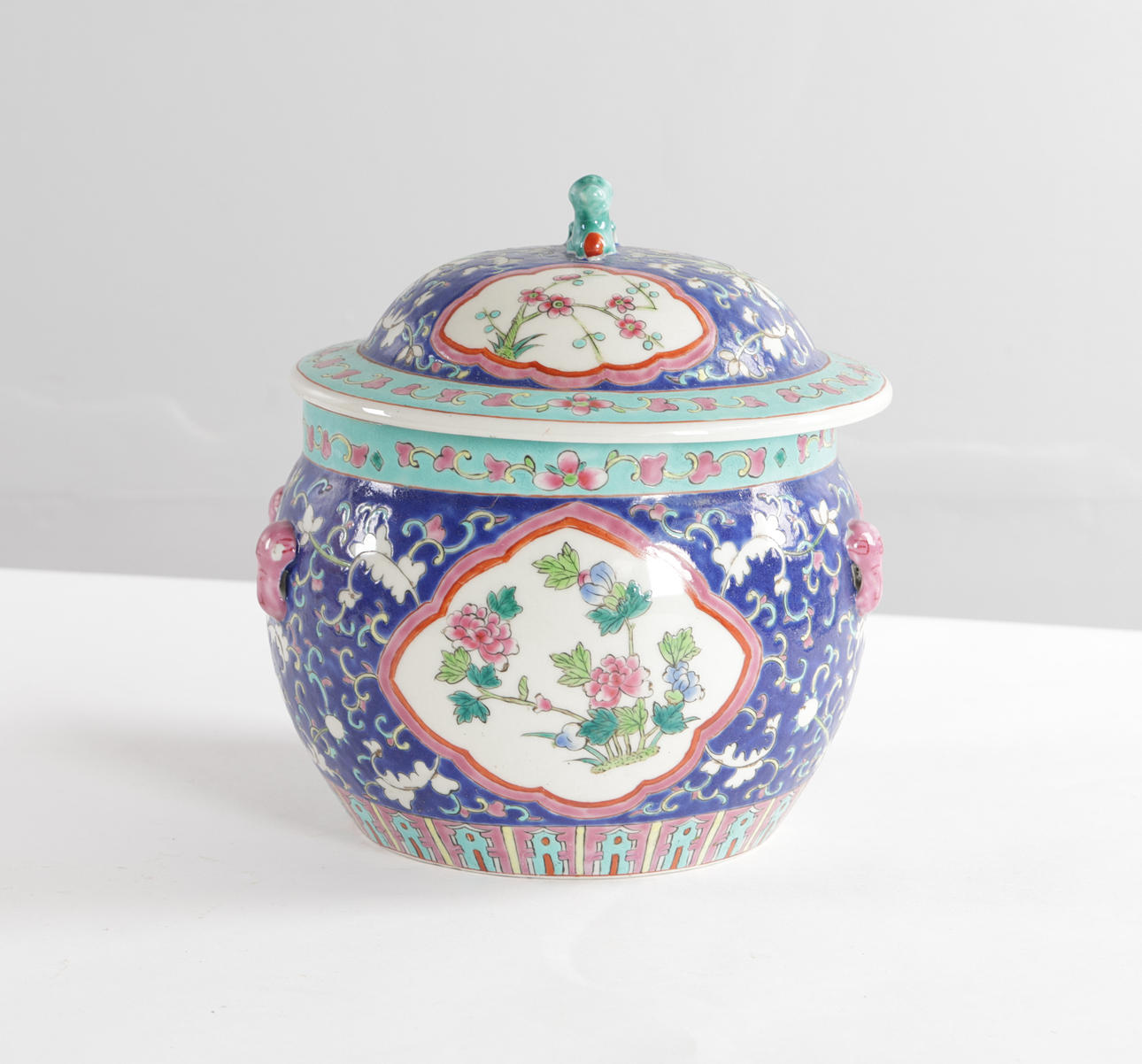Chinese lid jar, oriental multicolored motif.