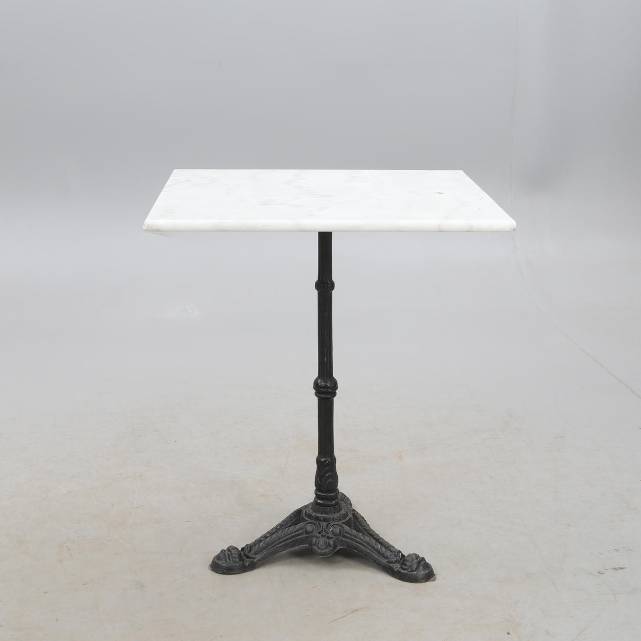 GARDEN TABLE, cast-iron stand, with marble top.