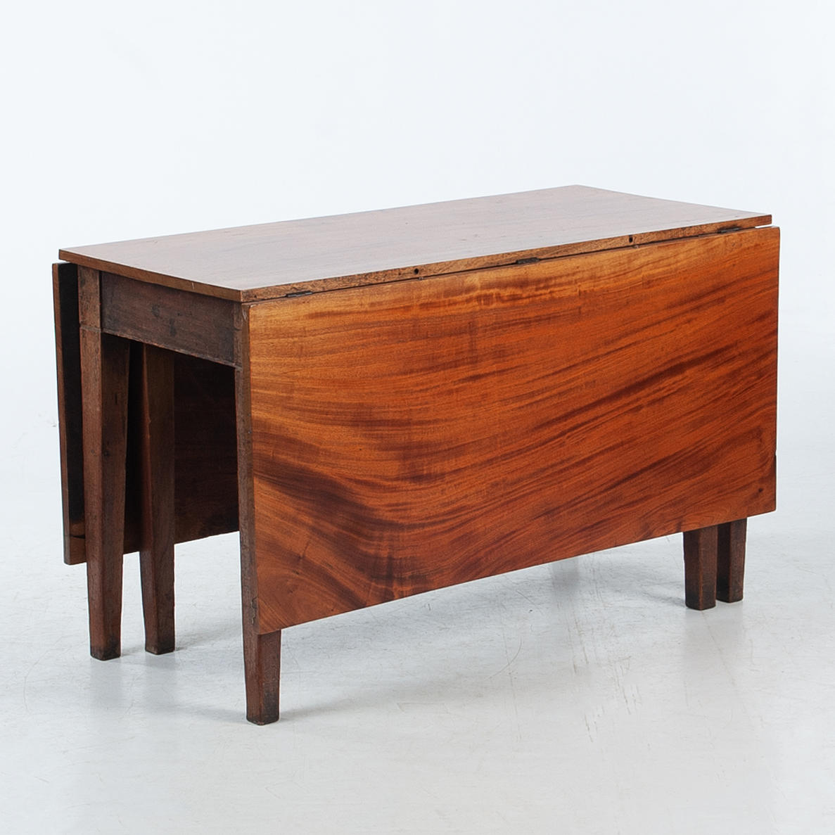 A mid 20th century folding table.