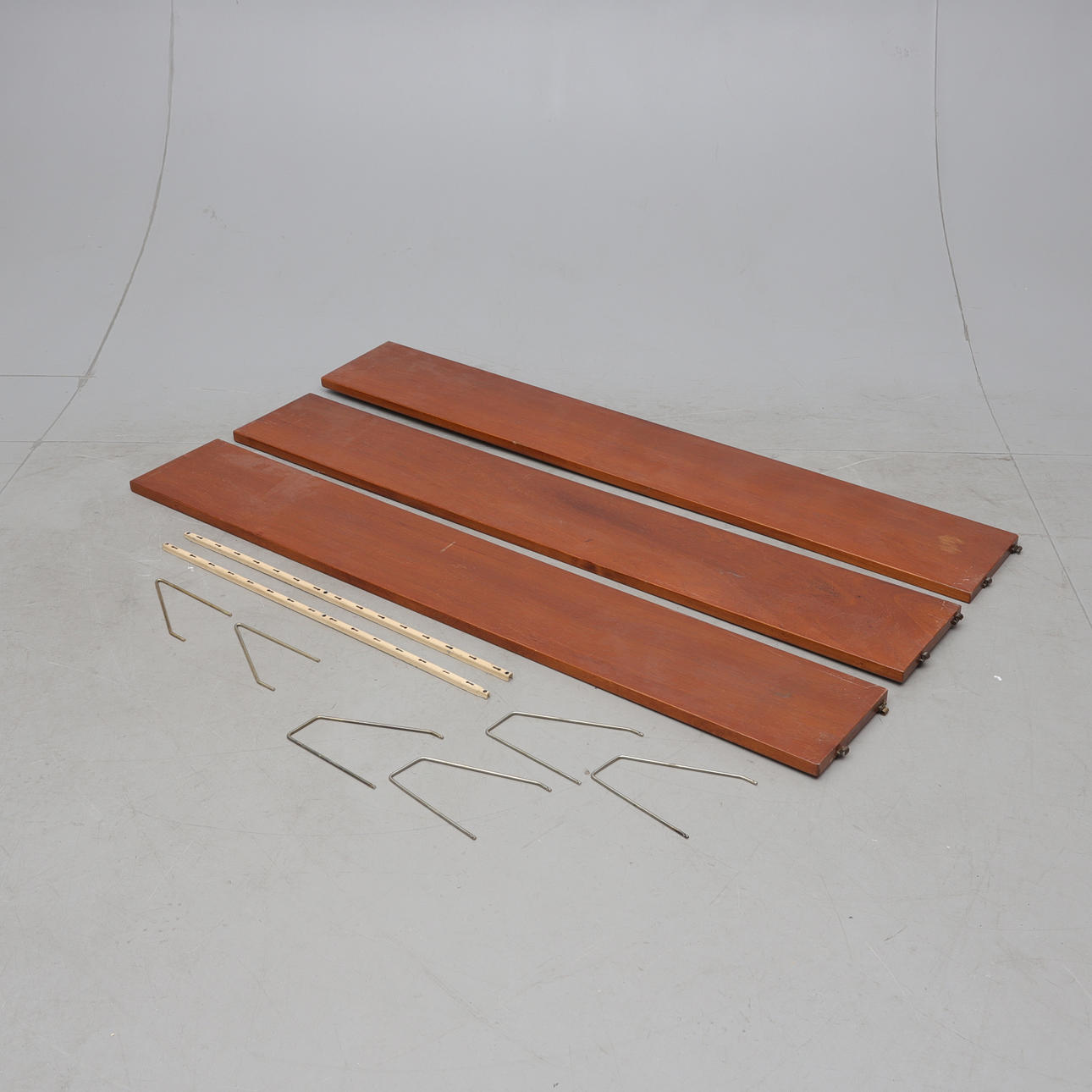 A wall shelf, metal/teak, 1950s.