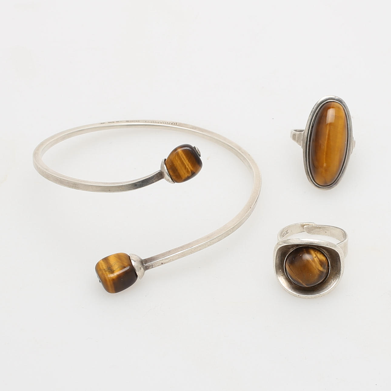 RINGAR, 2 st samt ARMBAND, silver och tigeröga, Alton KE Palmberg, Arvo Saarela.