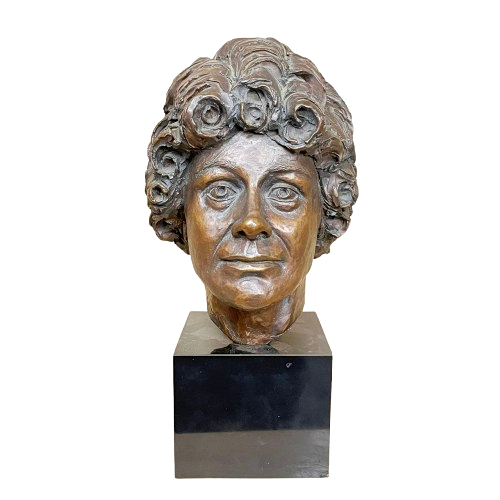 BRONZE BUST ON A MARBLE FINISHED STAND.