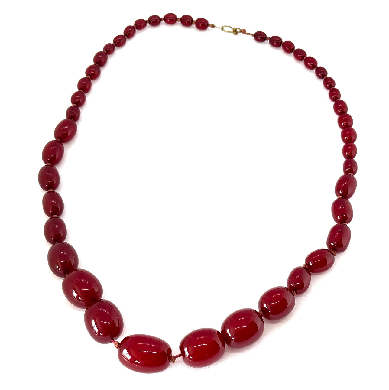 FAUX CHERRY AMBER NECKLACE.