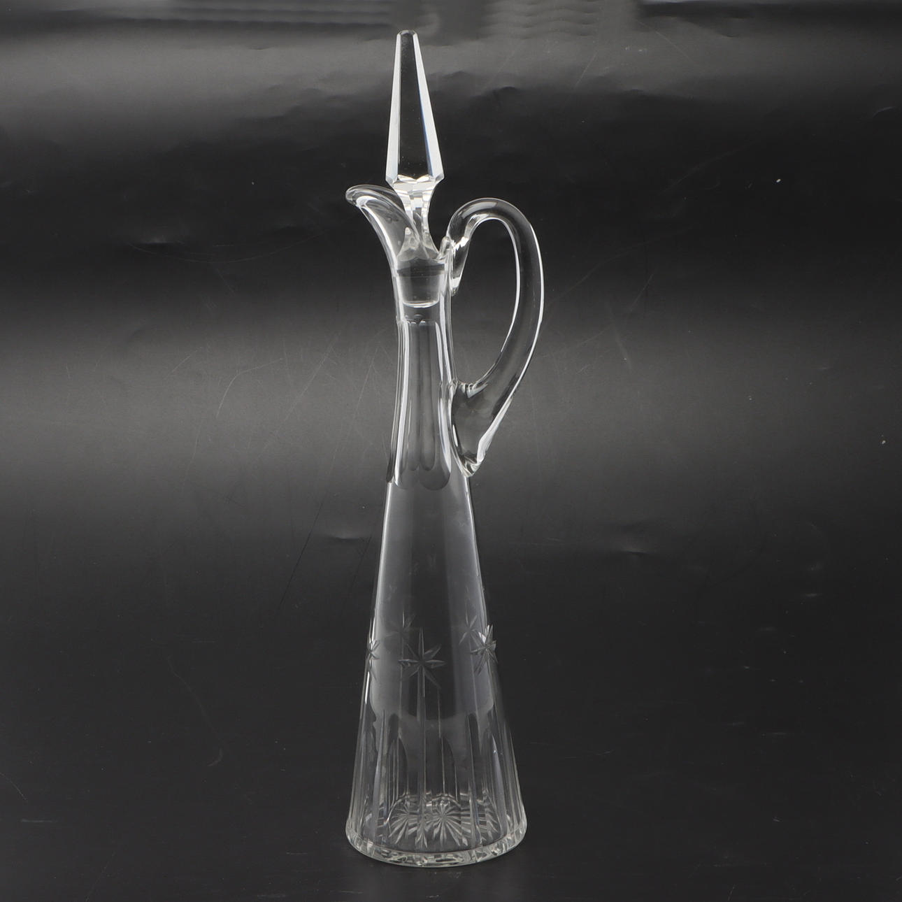 A decanter with a cut pattern, glass, 1920s.