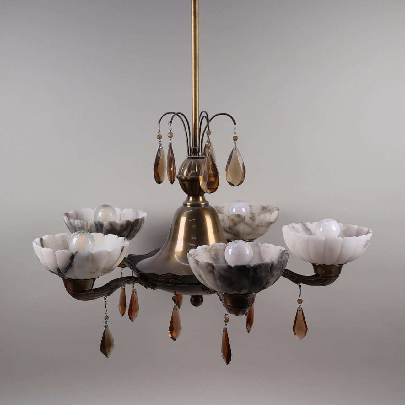 A 5-arm ceiling lamp, art deco style, alabaster cups, first half of the 20th century.