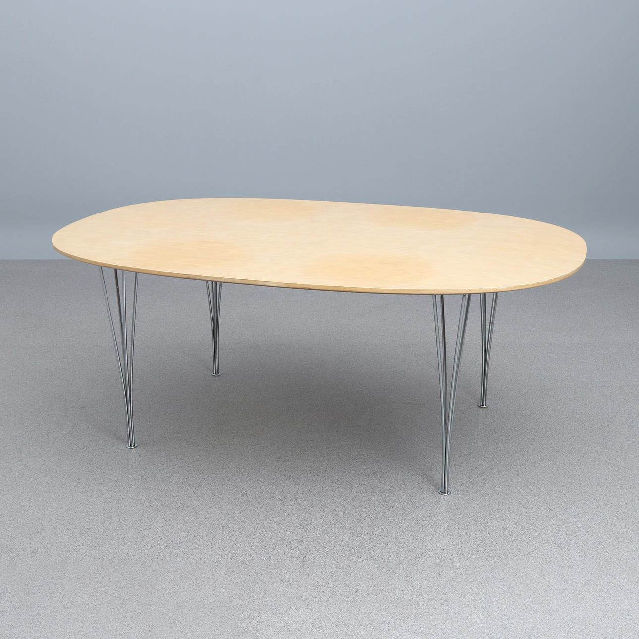 PIET HEIN & BRUNO MATHSSON. DINING TABLE. Book with legs in chrome-plated metal. “Superellipse”. Fritz Hansen 1986, marked underneath.