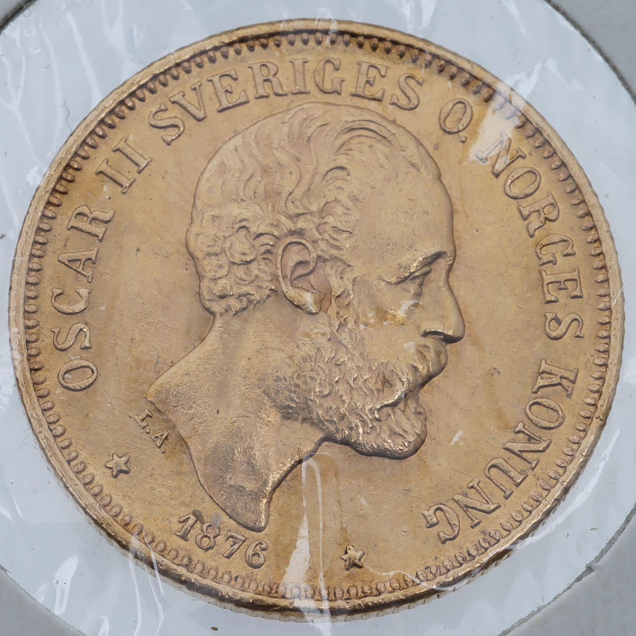 MØNT, 21,6K guld, 20 kroner, 1876.