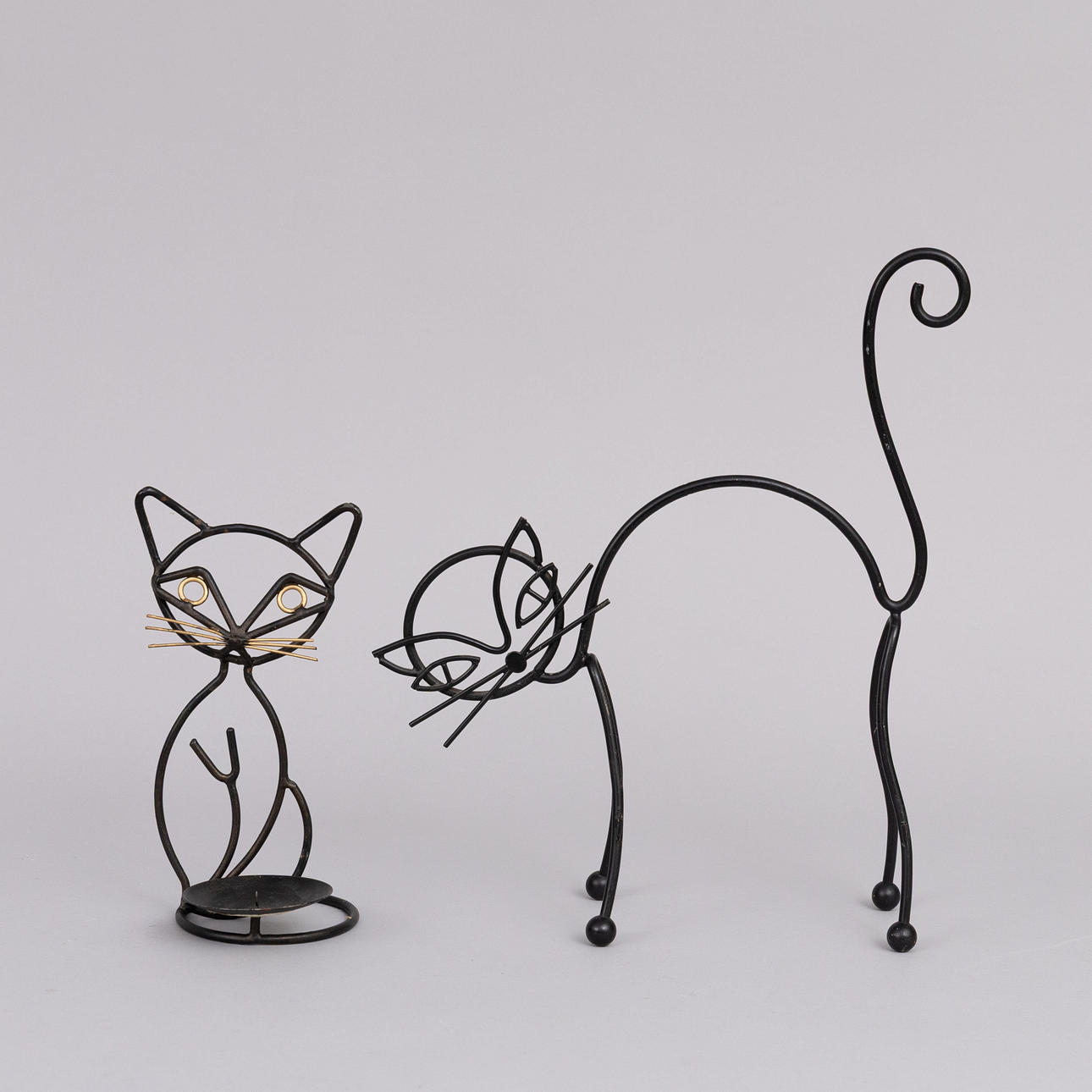 GUNNAR ANDER. Candlesticks, 2 pieces, wrought.
