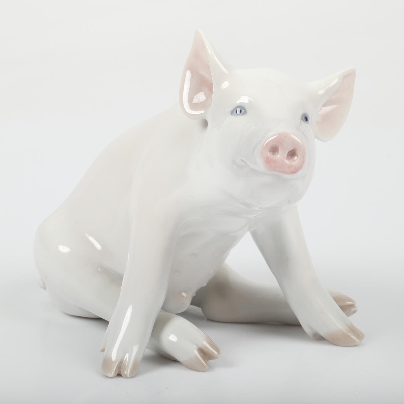 ERIK NIELSEN. A figurine, pig, porcelain, Royal Copenhagen.