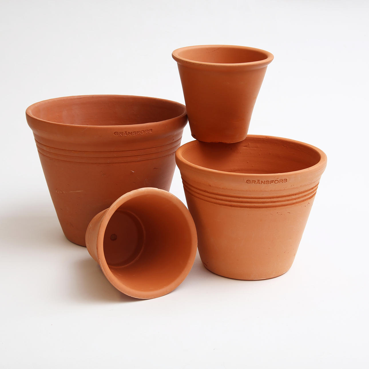 A set of 4 clay pots, Gränsfors.
