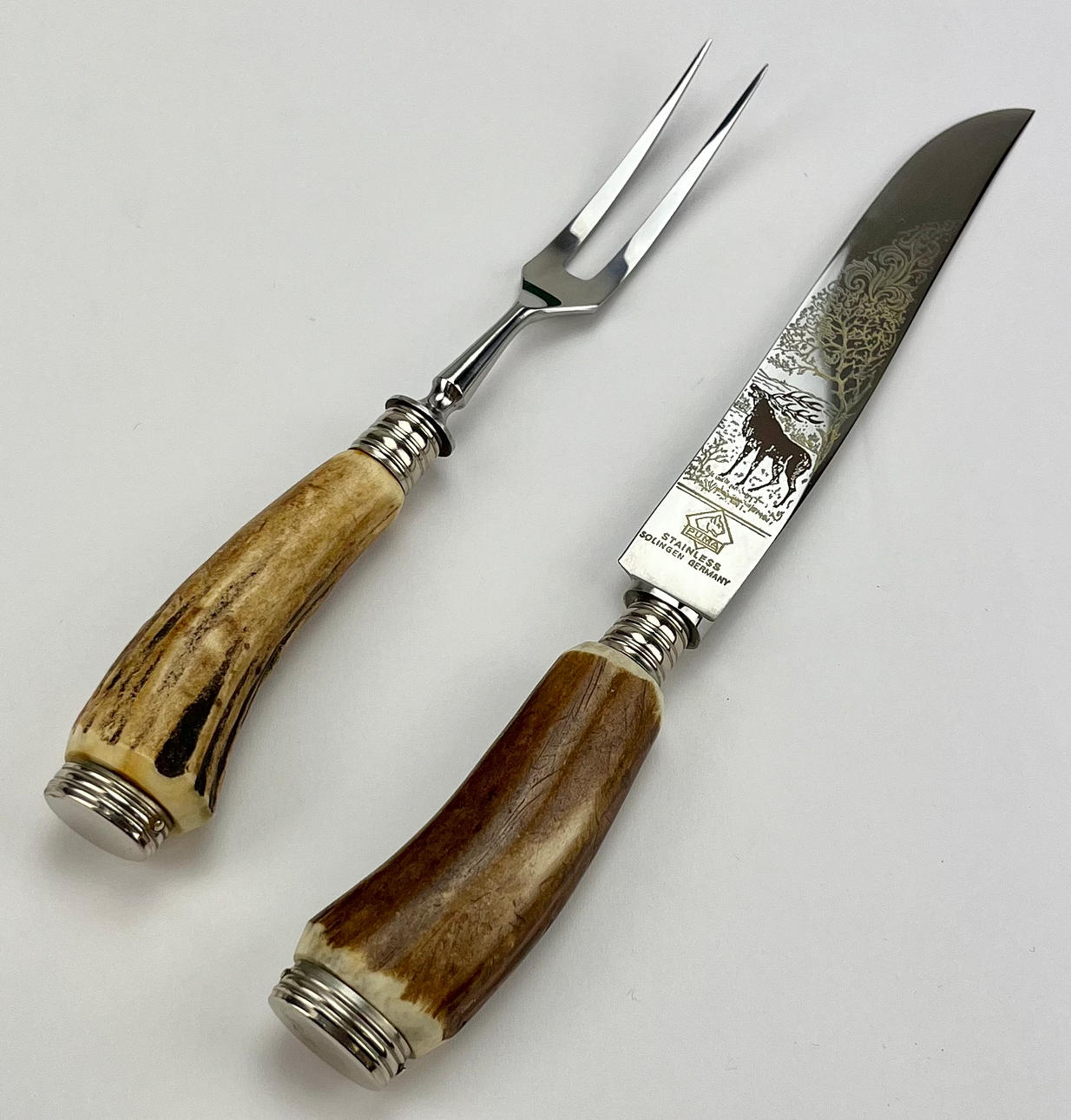 Ein 2-teiliges TRANCHER-BESTECK, Puma, Solingen, Deutschland.