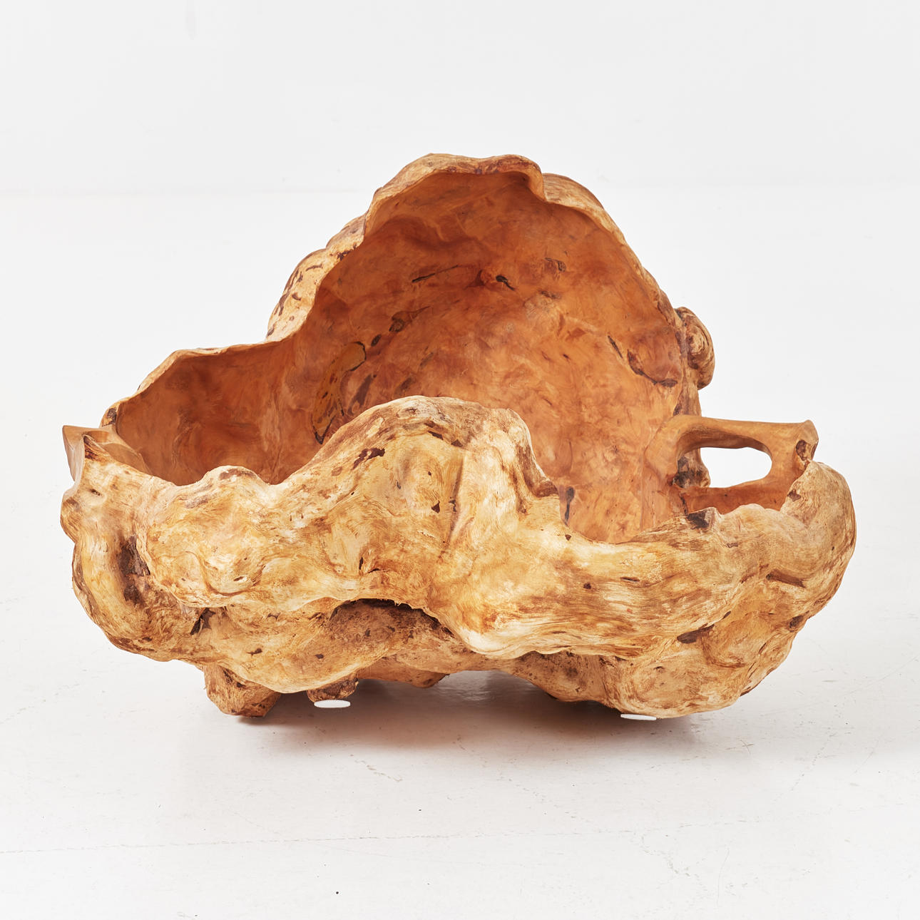 VRIL, birch, with sculpted handles on the sides.