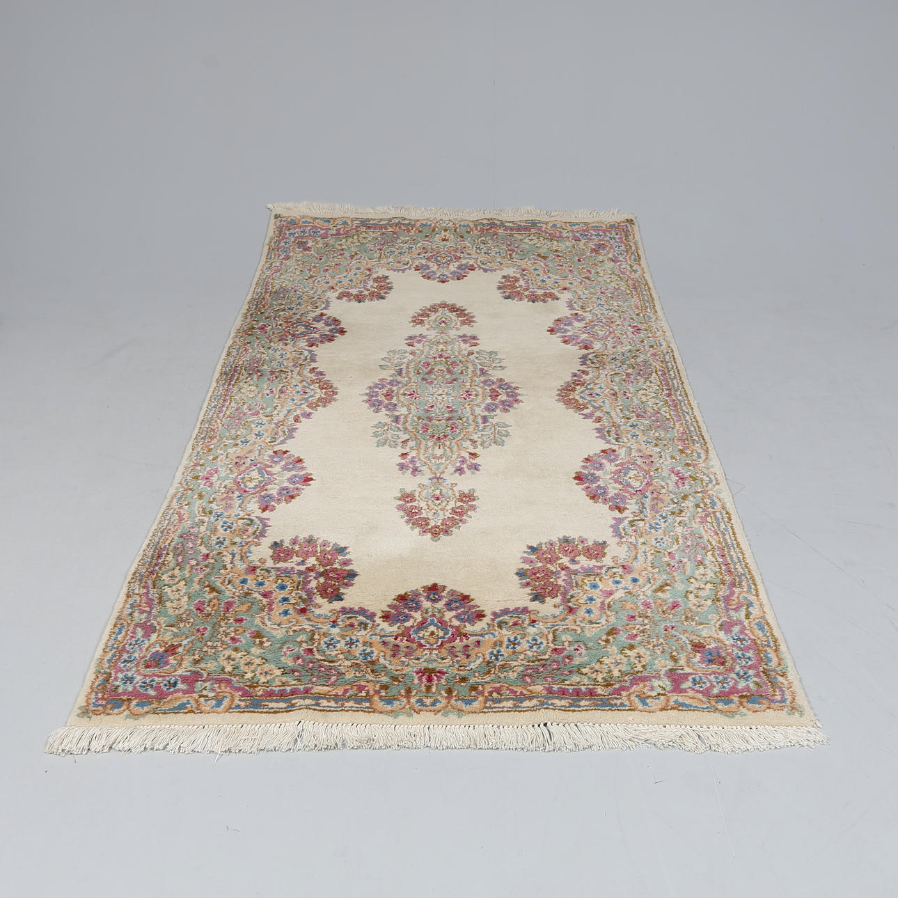 A CARPET, oriental, Kerman, approx 219x124m.