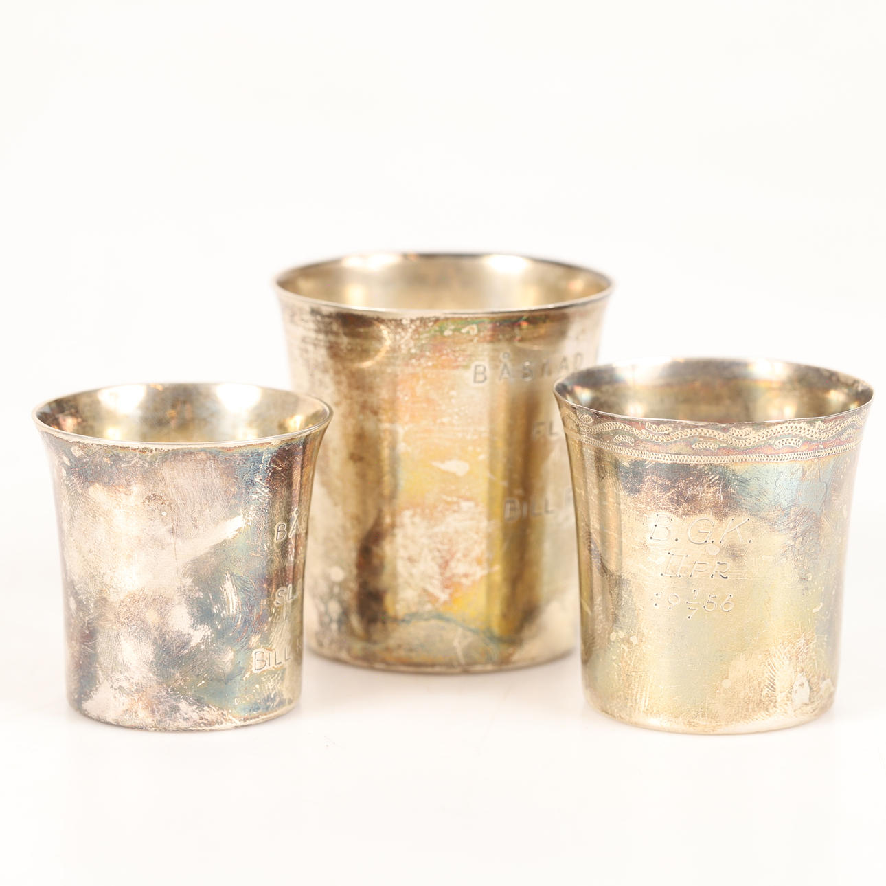 TROPHIES, 3 pieces, silver.