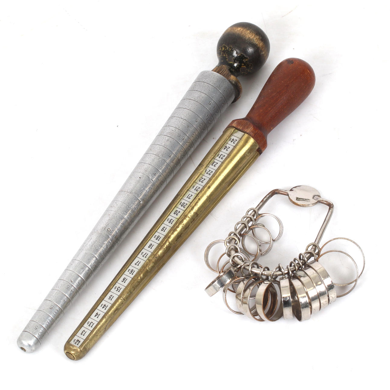 A 3-piece ring measuring cup, 20th century.