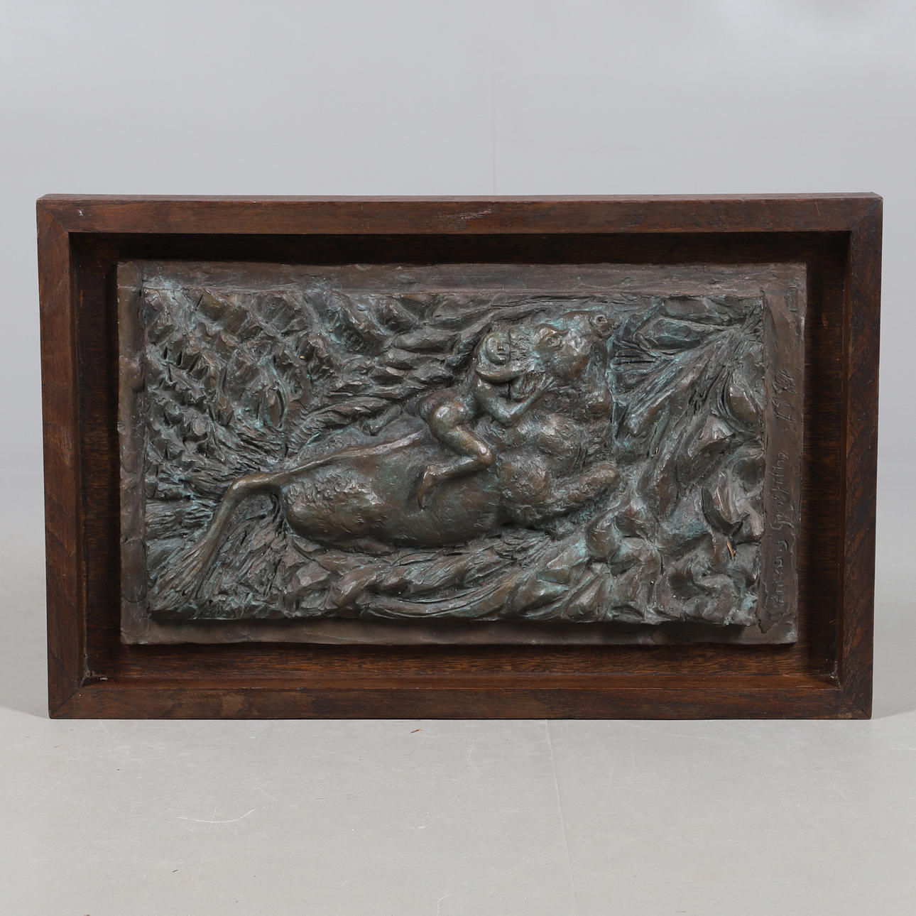 A 20TH CENTURY BRONZE PLAQUE.