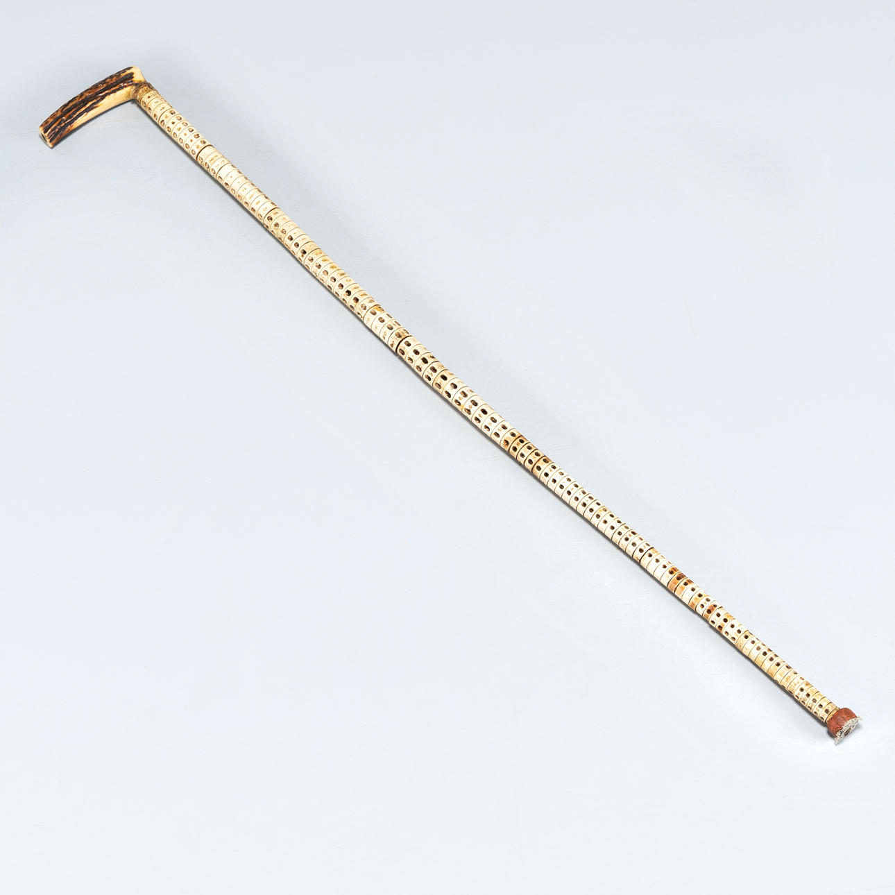 A walking stick, legs, mid 19th century.