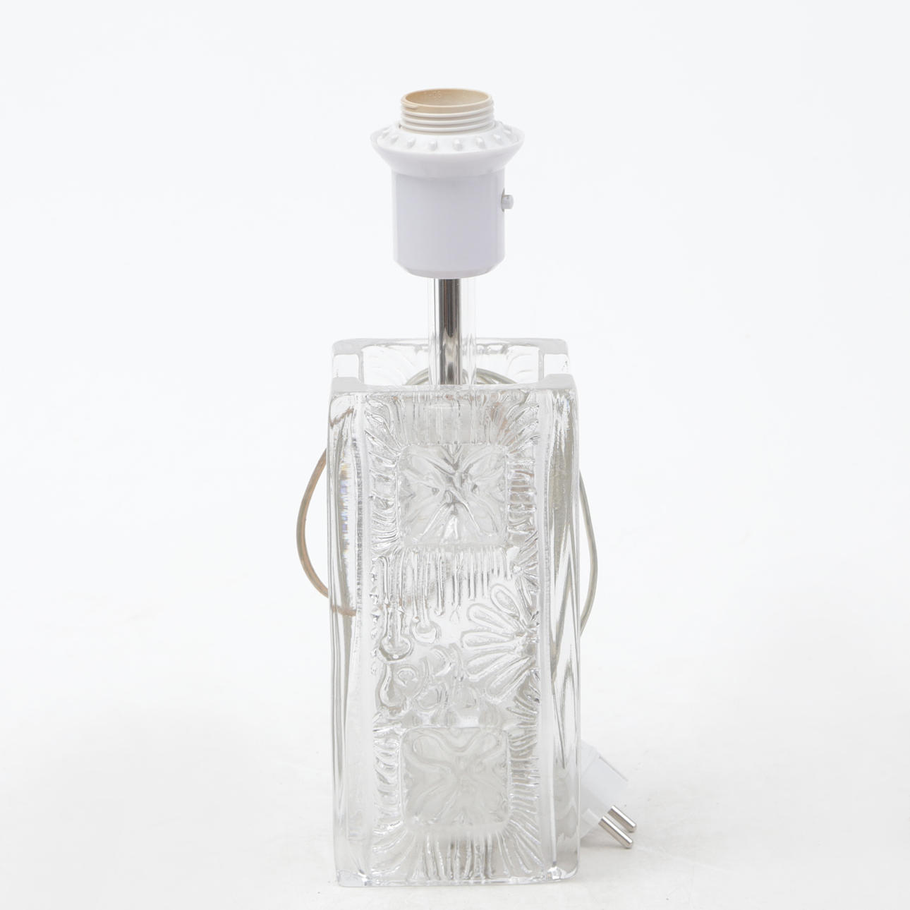 A 1960 Pukeberg glass table lamp.