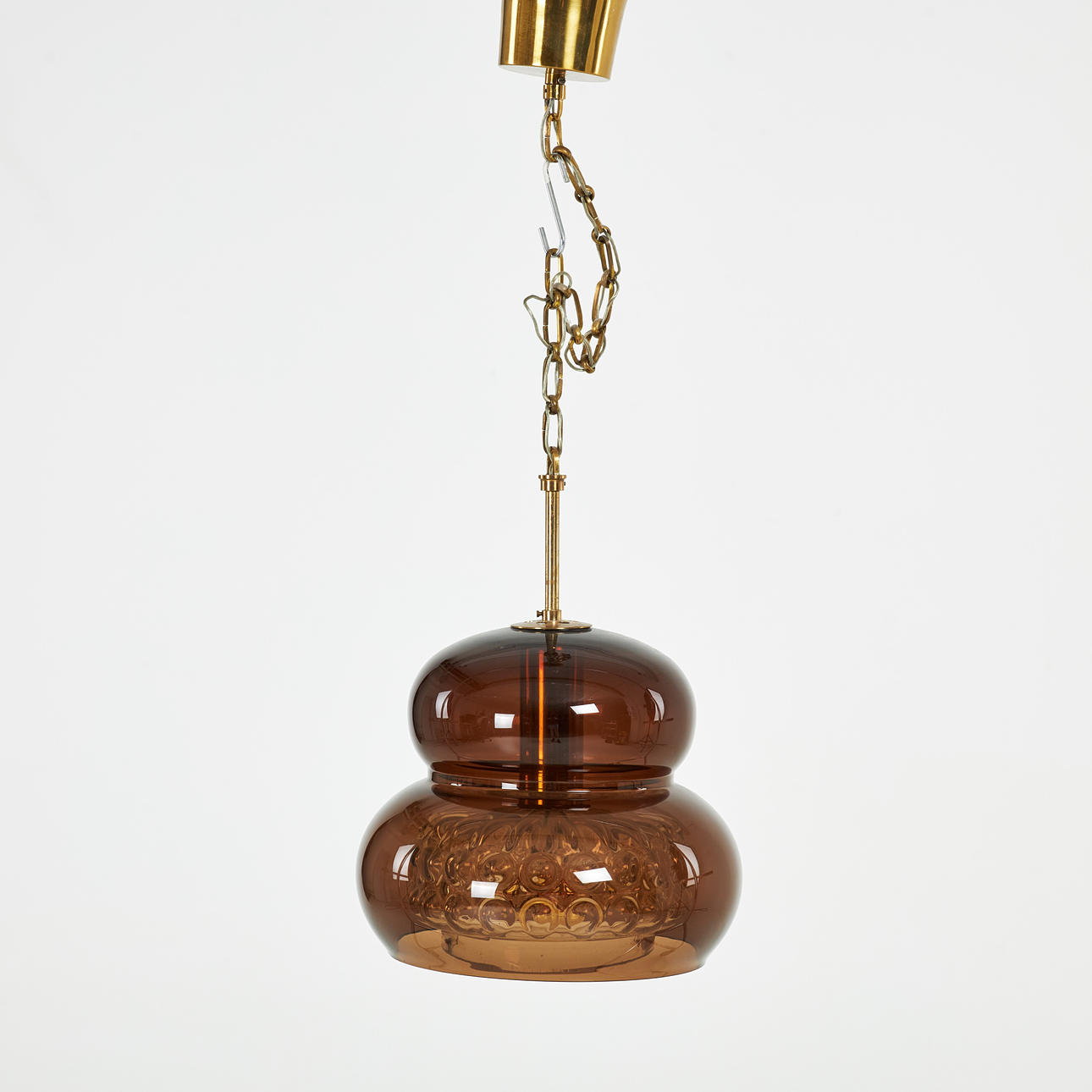 CARL FAGERLUND. A glass and brass “Bubblan” ceiling lamp, Orrefors.