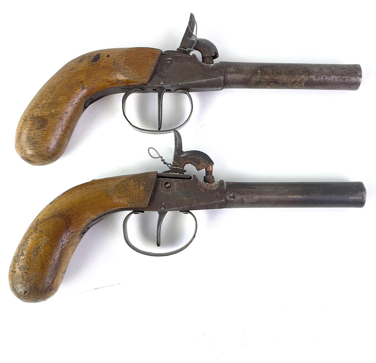 Two lock guns, 19th century.