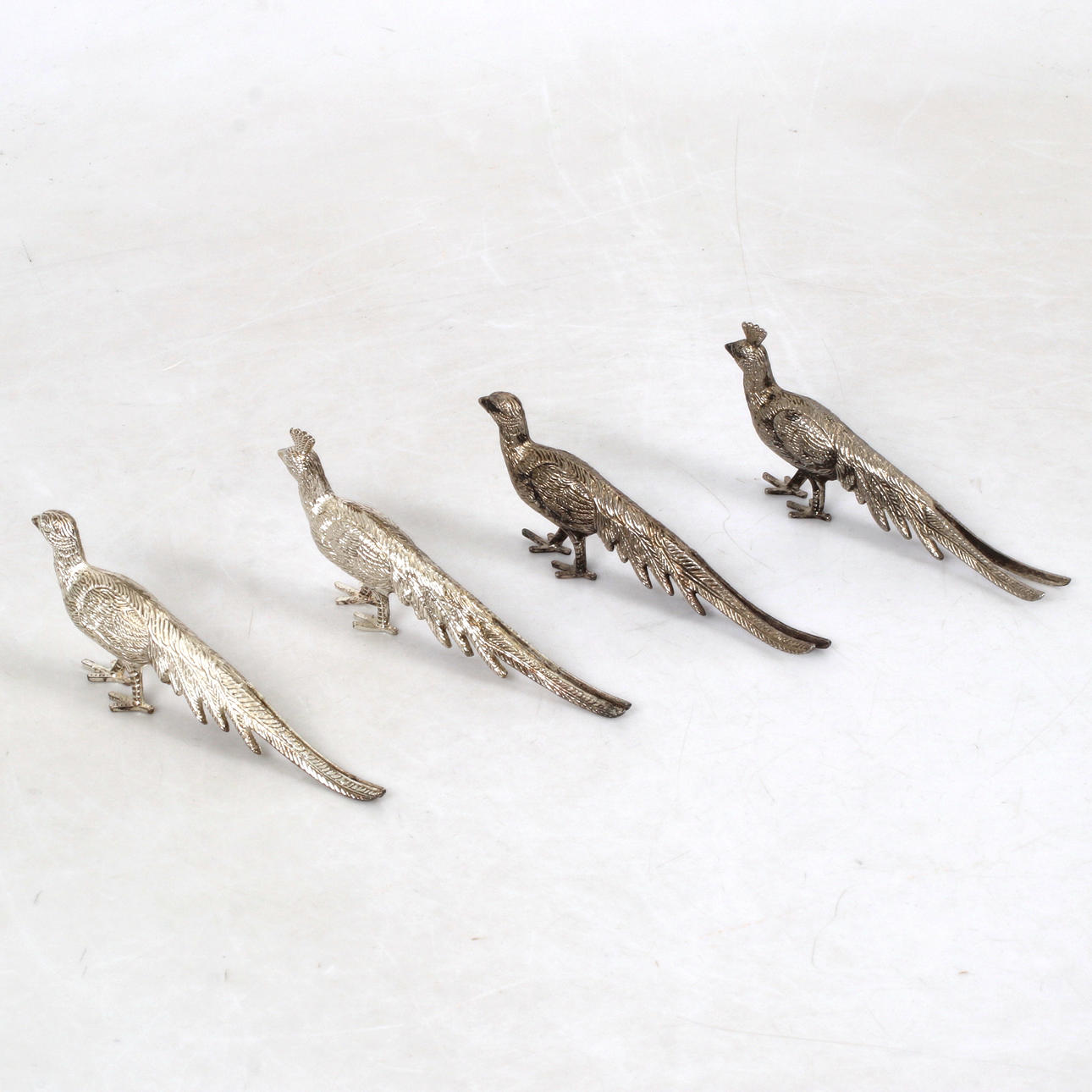 PÖYTÄKORISTEET, 4 st, metall, 1900-tal.