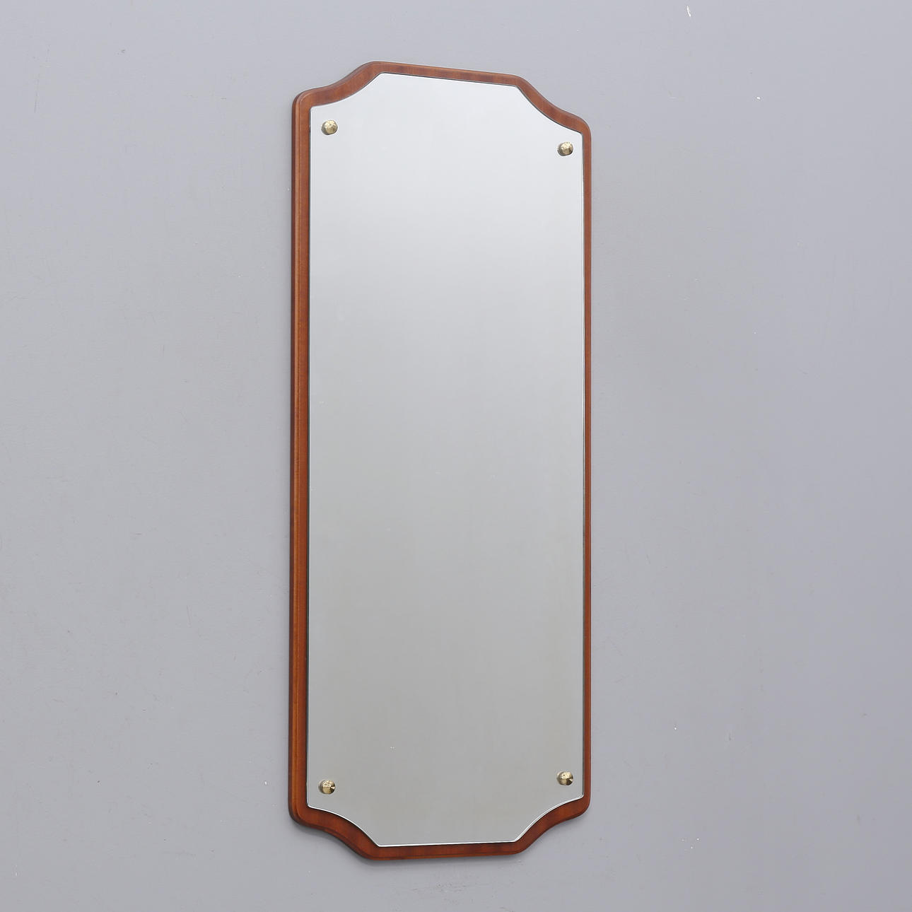 A mirror, wooden frame with metal pins, second half of the 20th century.