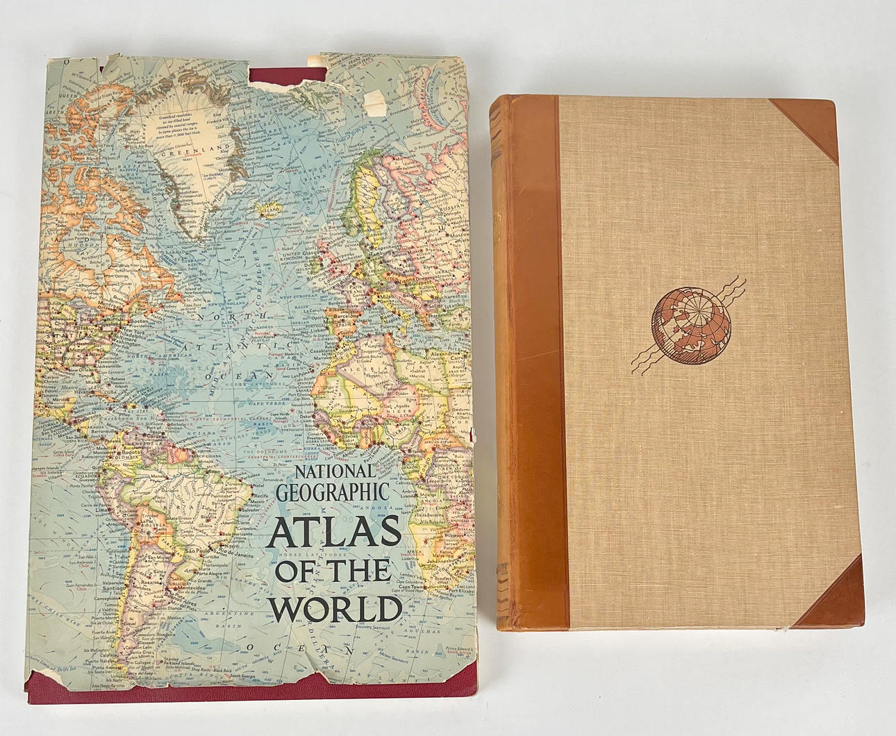 Two 20th century world atlases.