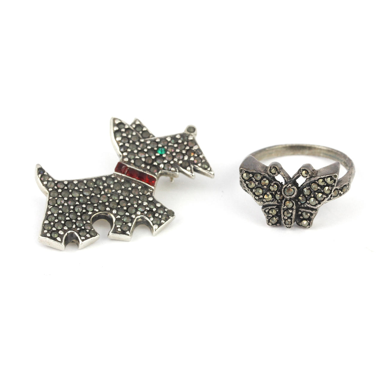 DOS JOYAS DE PLATA Y MARCASITA.