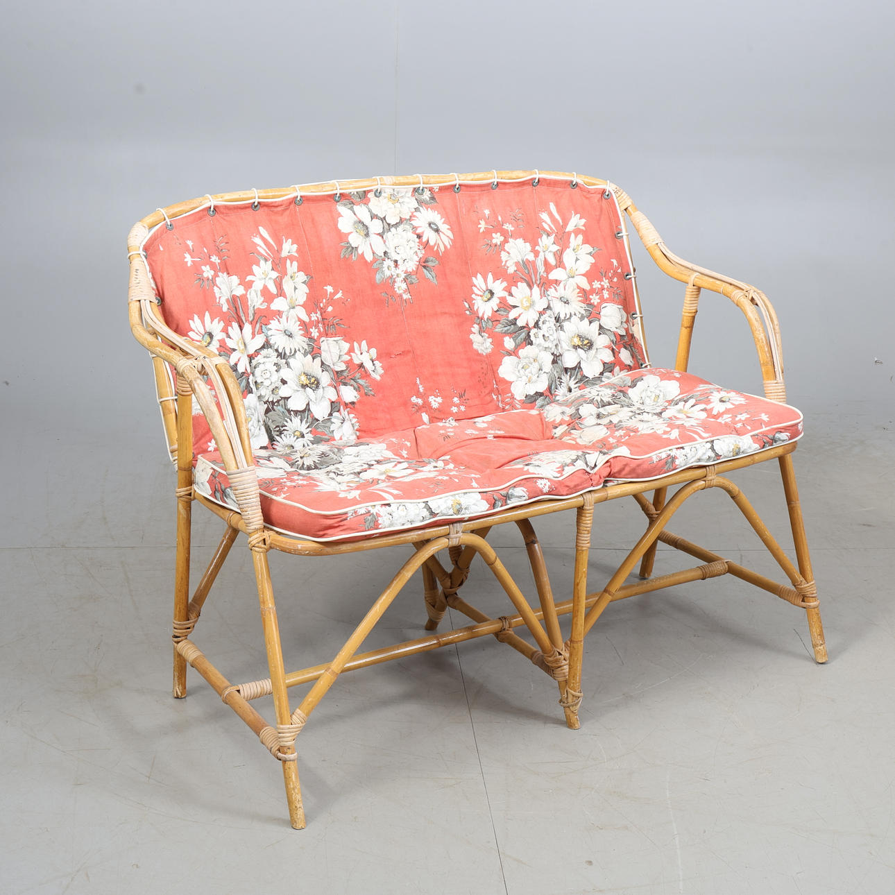 A mid 20th century sofa, rattan and bamboo.