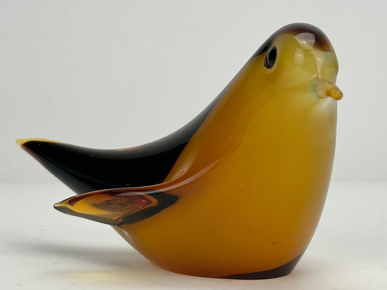 A GLASS FIGURINE. Possibly Murano.