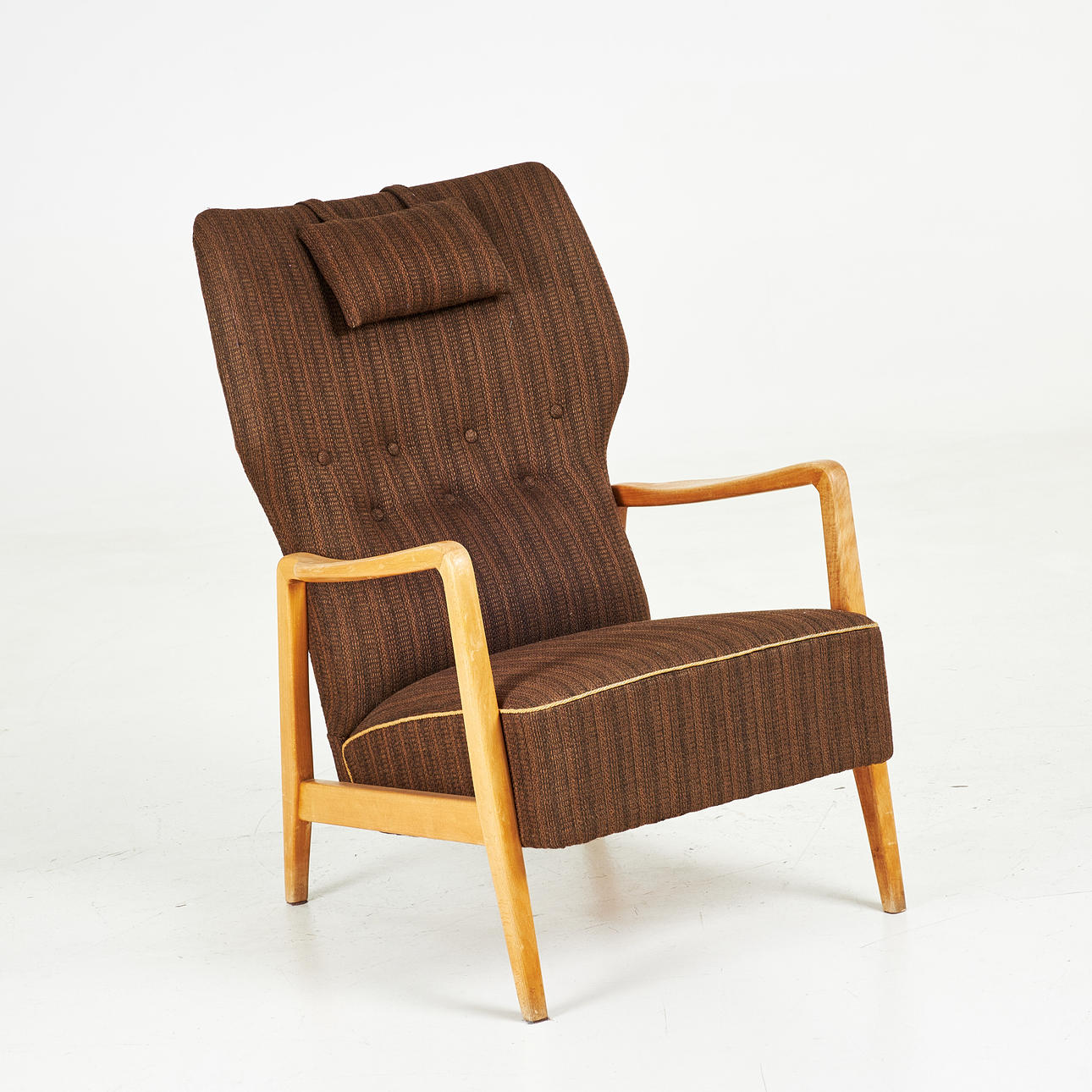 DUX, armchair, 1940/50's, deep buttoned buttons, upholstered in dark brown textile, tray marked at the bottom.