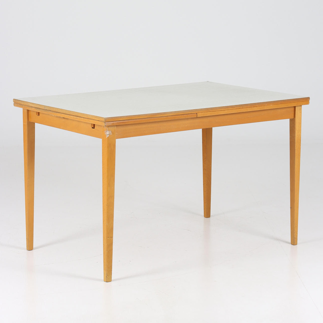 A “jumble” dining table, perstorps plate. 1950s/60s.