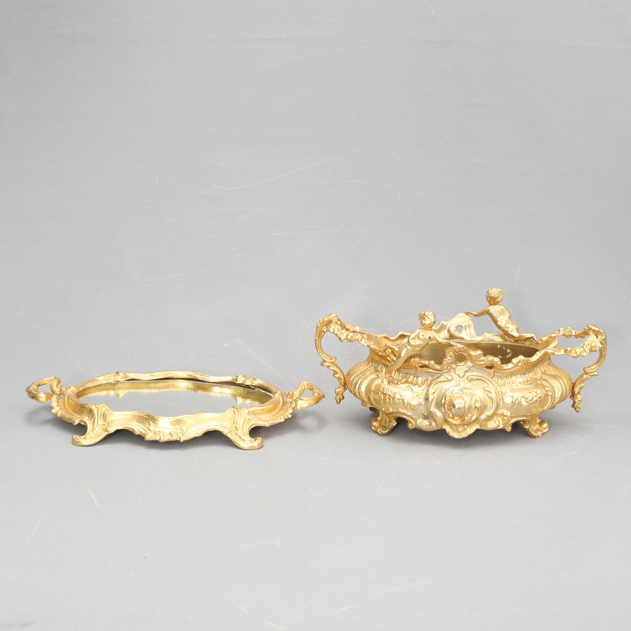 TABLE TABLE/JARDINÄR, Rococo style, brass.