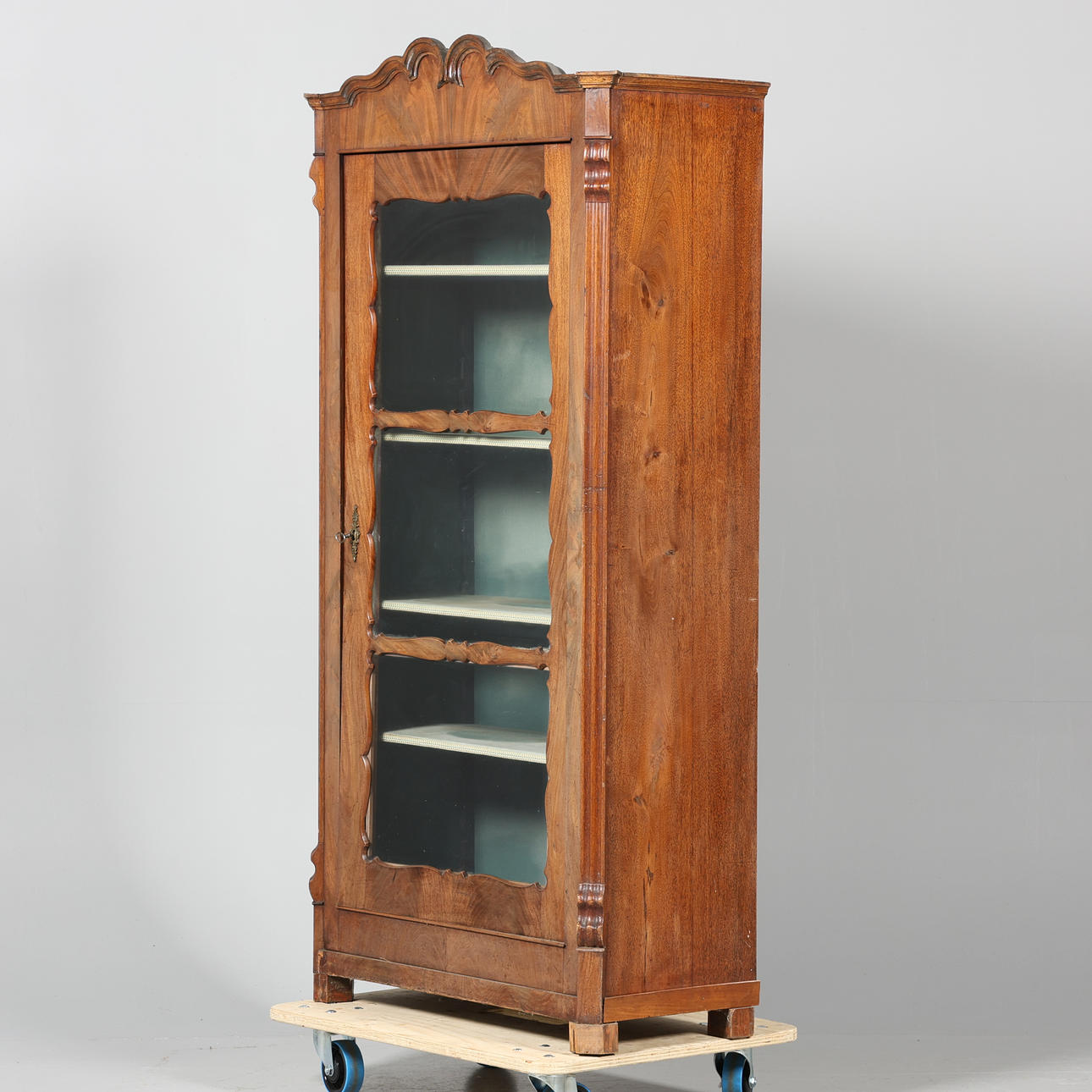A 19th century display cabinet.