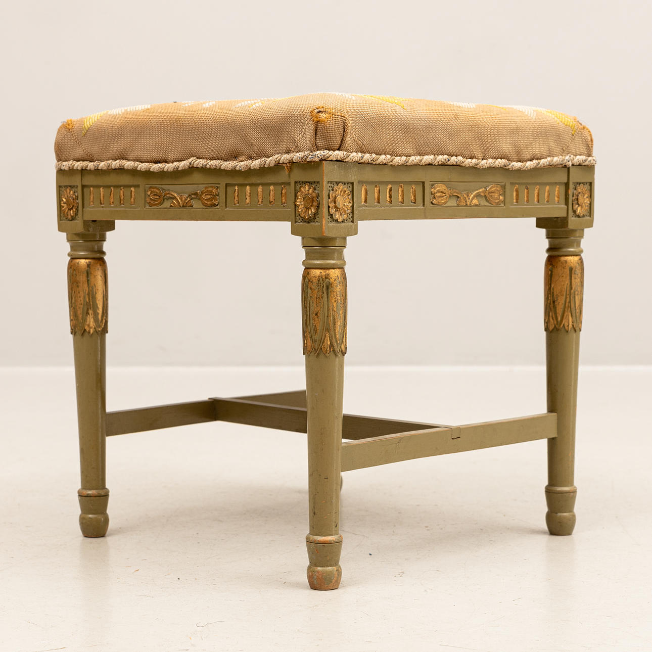 A 20th century Gustavian style stool.