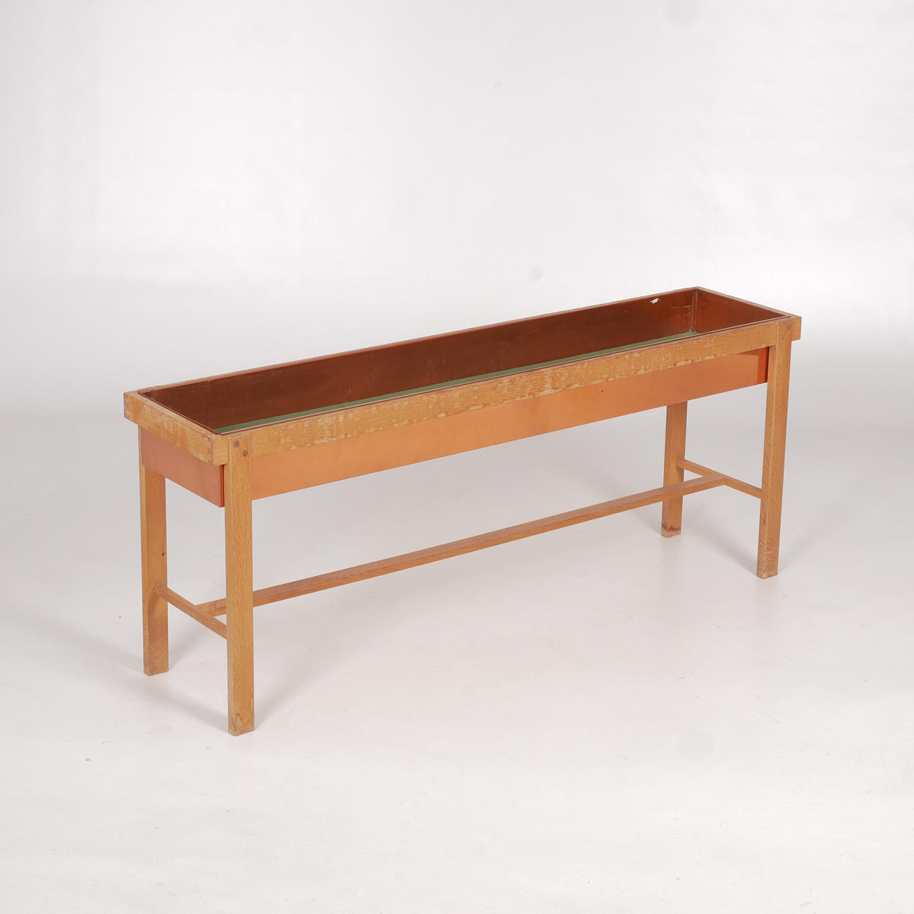 A 1960's teak and copper flower table.