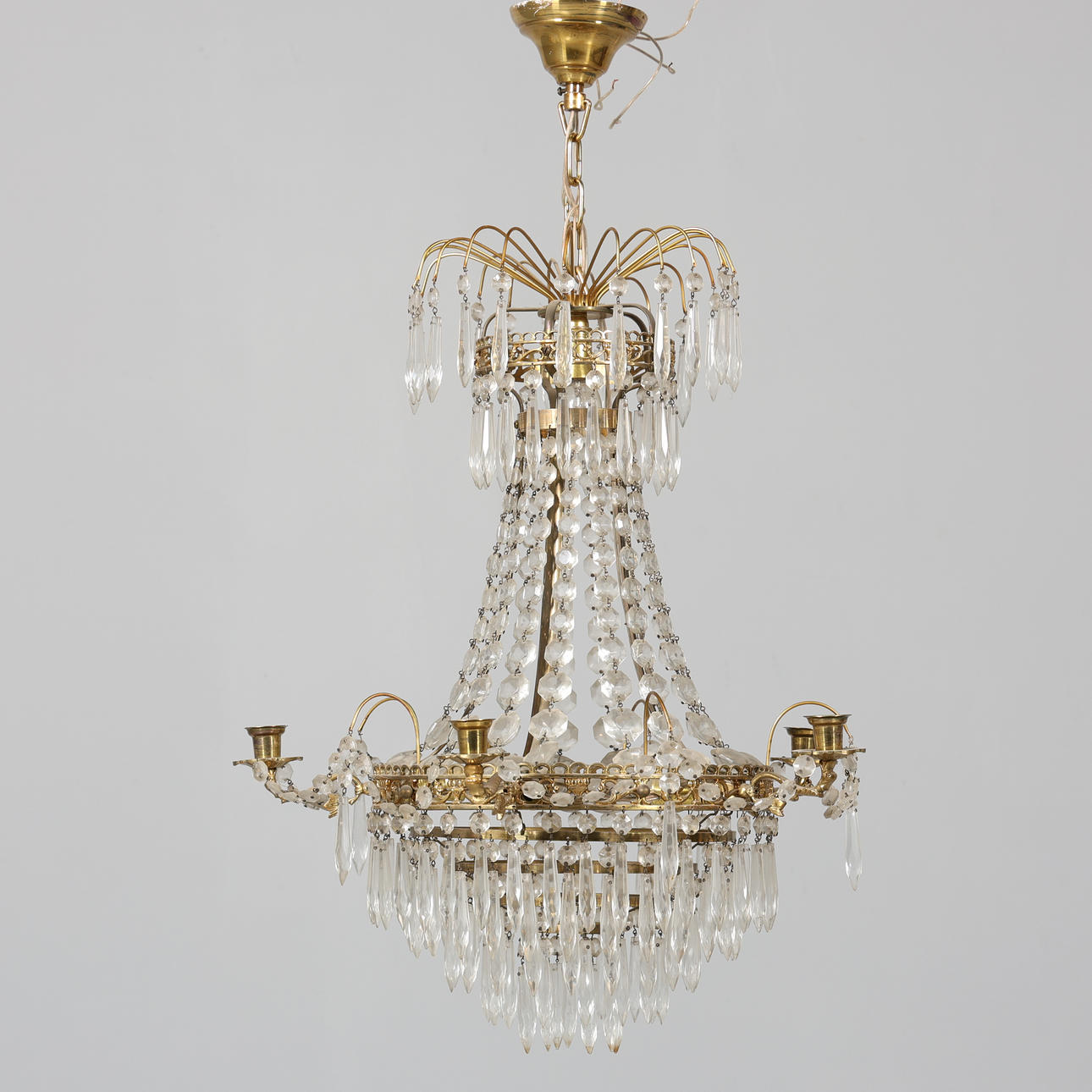 An empire-style chandelier, electrified.