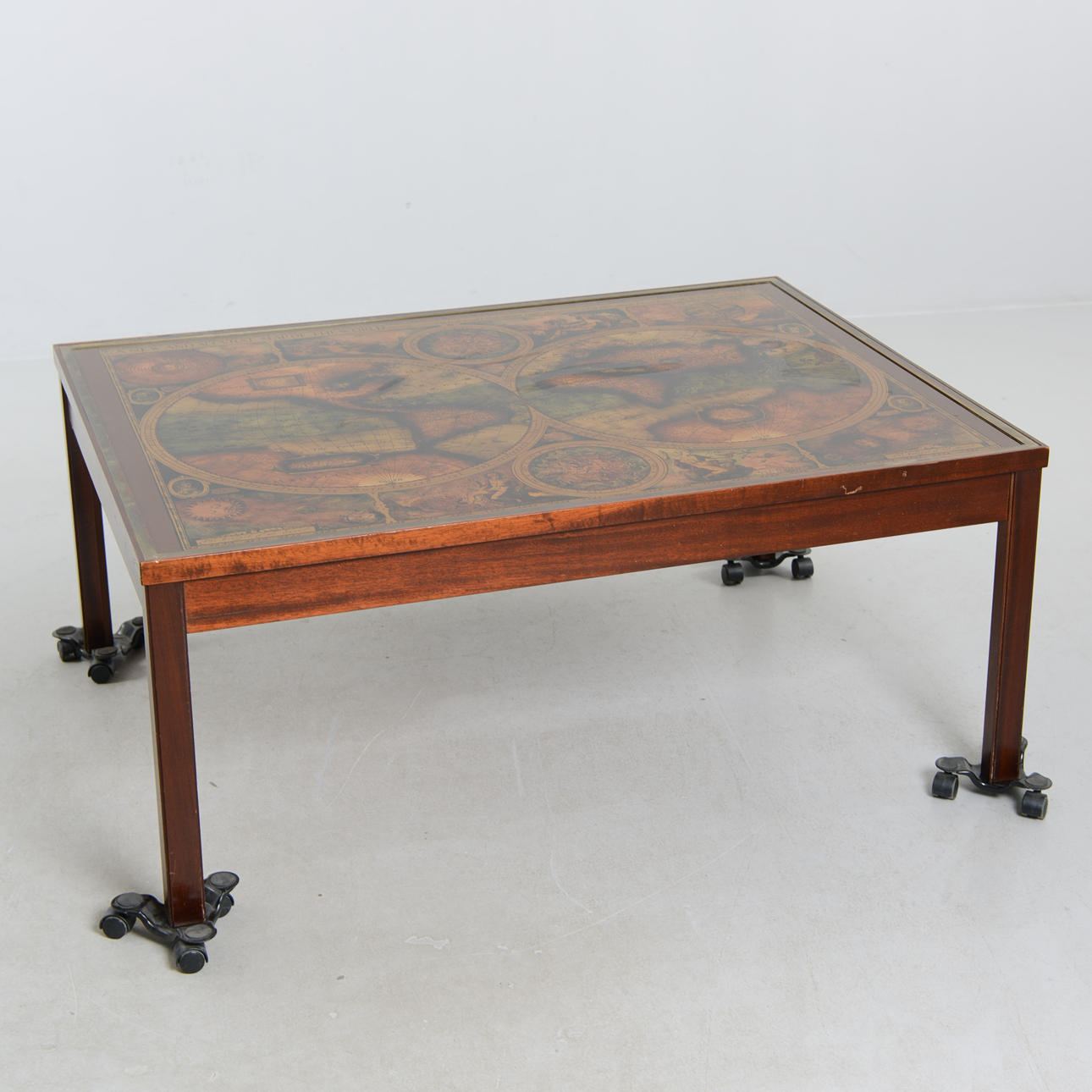 Coffee table with top of world map, 20th century.