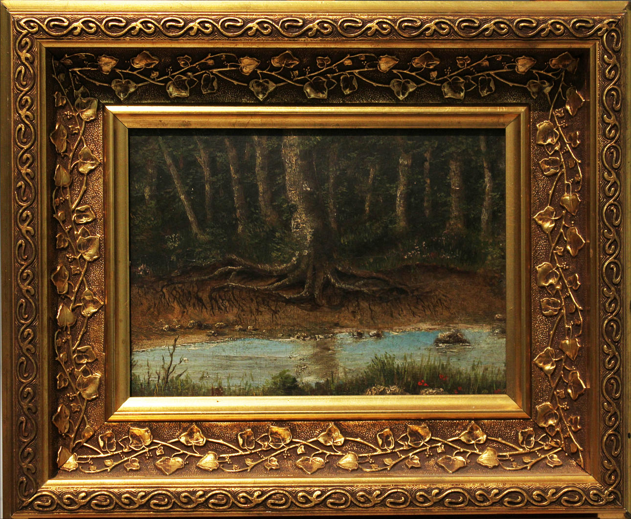 OKÄND KONSTNÄR. Gåramålning. Skogslandskap med å. Olja på pannå. Osignerad.