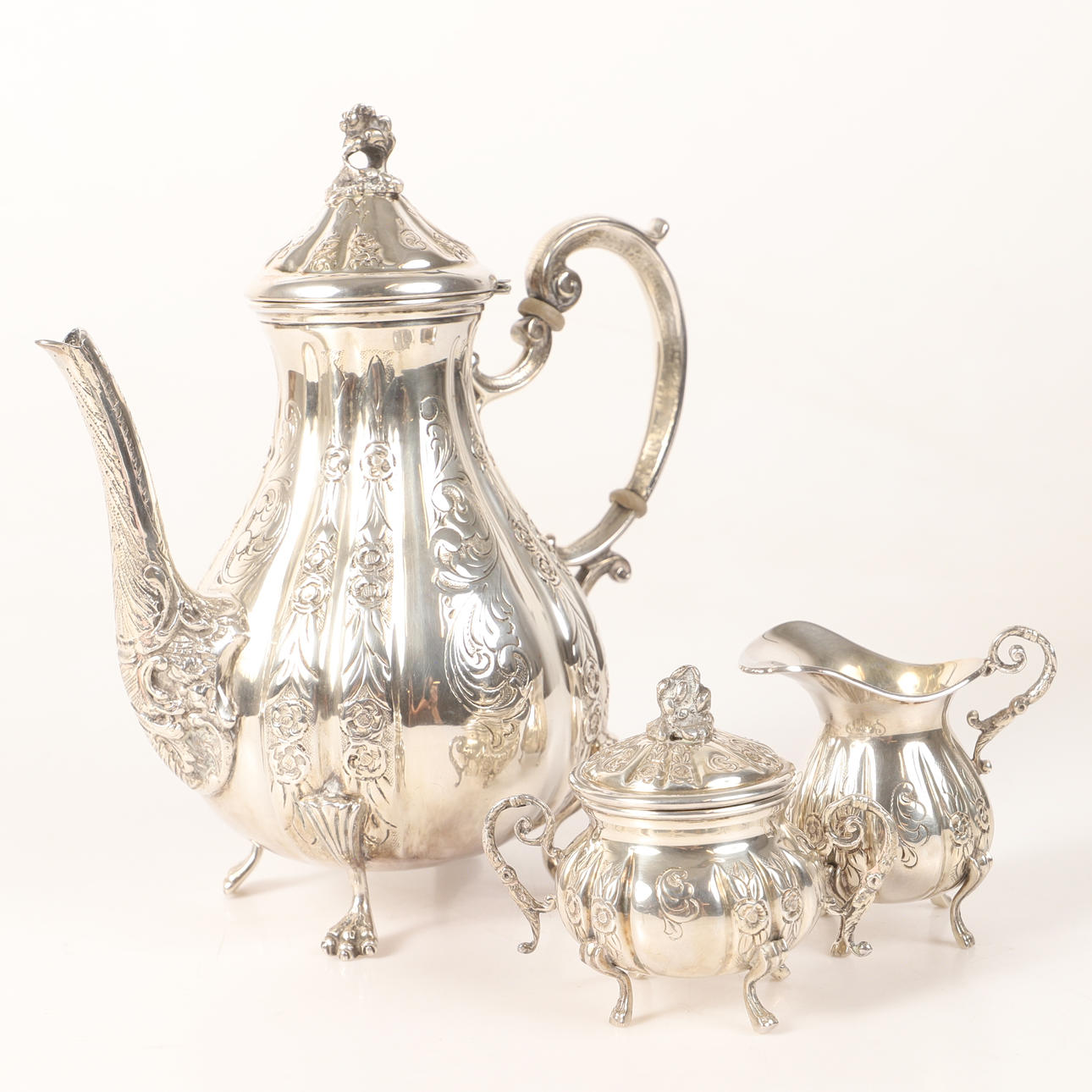 COFFEE SET, 3 pieces, silver with relief decor.