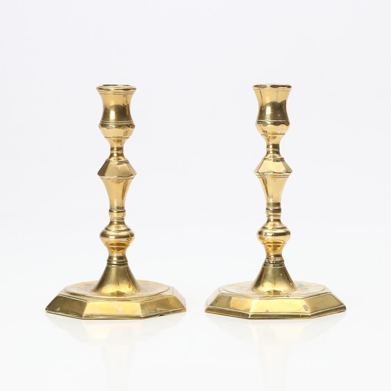 CANDLESTICKS, A PAIR. Brass. Late Baroque, 18th century.