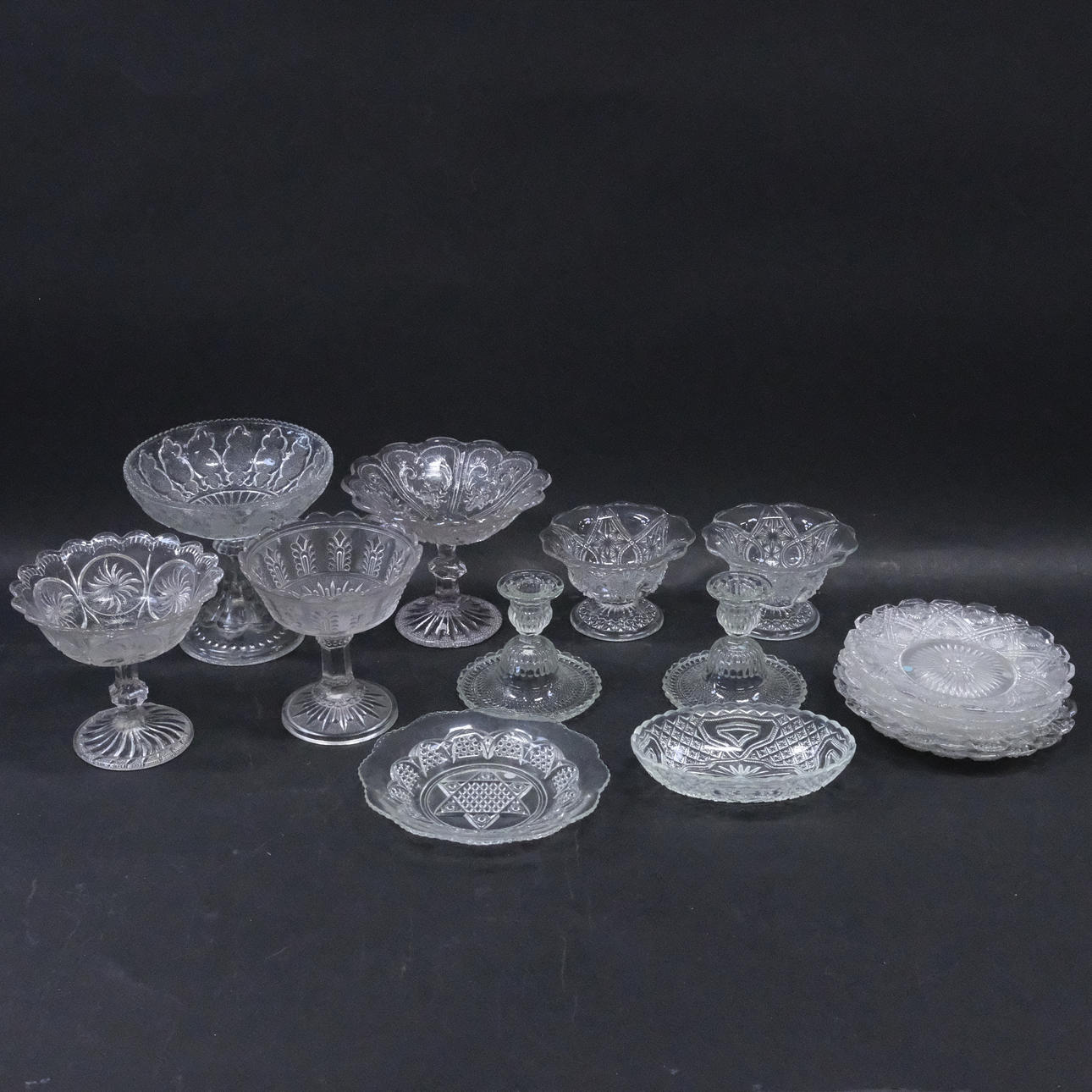 PRESS GLASS, 15 PIECES, CIRCA 1900.