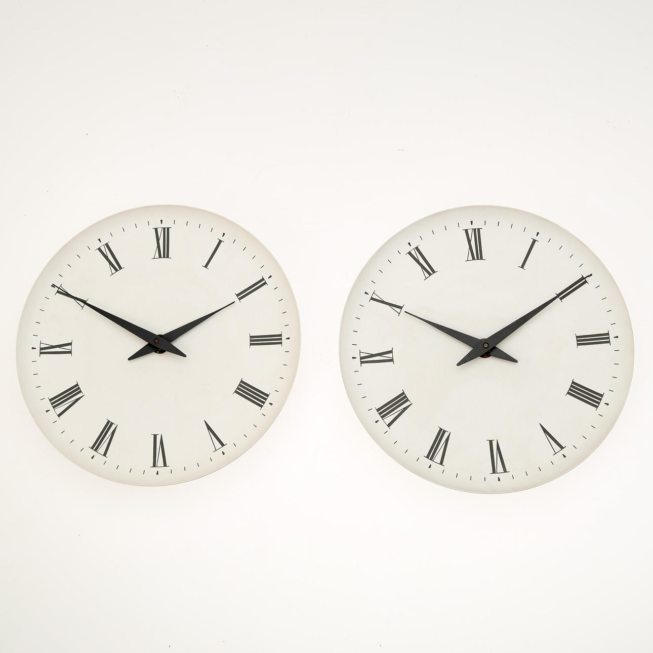 HENNING KOPPEL. Two wall clocks for Louis Poulsen (2).