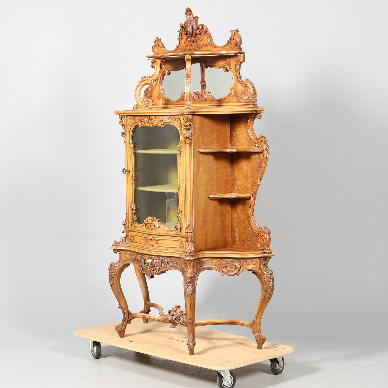 A rococo style display cabinet, 1800/20th century.