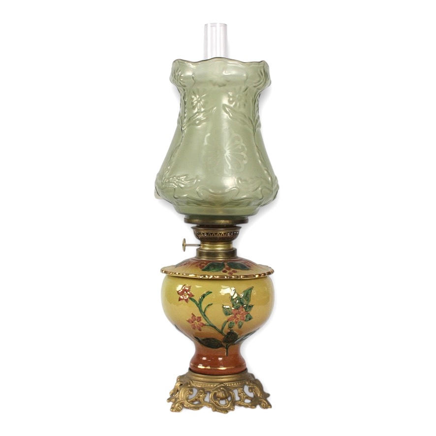 A 20th century majolica kerosene lamp.